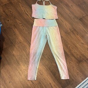 Beyond Yoga Pink, teal and yellow tights and workout top